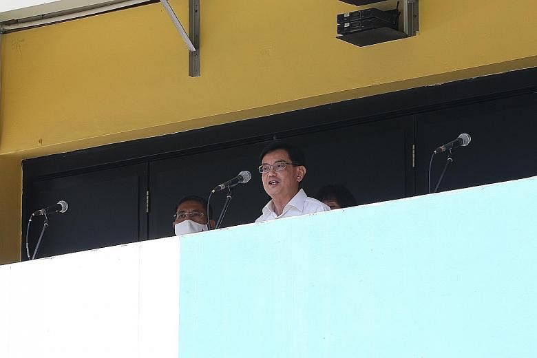 Deputy Prime Minister Heng Swee Keat speaking at St Anthony's Canossian Primary School yesterday. He said on Facebook that the PAP cannot afford a gap in East Coast GRC in these uncertain times, and a full team is needed to take care of the residents