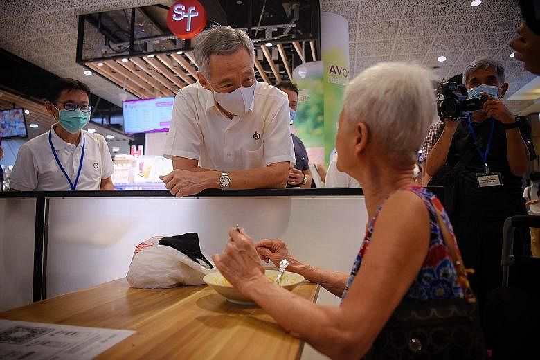 Prime Minister Lee Hsien Loong, who is helming the People's Action Party team in Ang Mo Kio GRC, chatting with an elderly resident at AMK Hub during a walkabout yesterday. For Singapore to get through the crisis, it must have the best possible leader