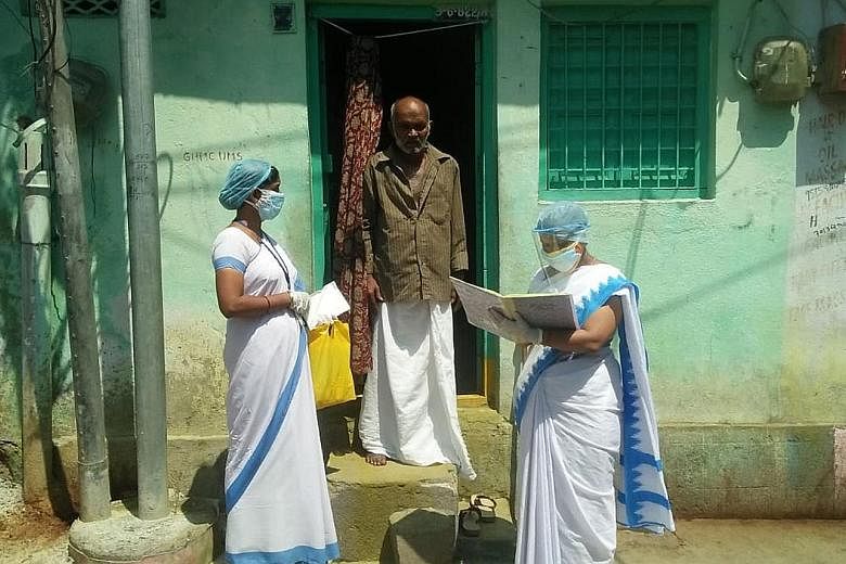 India's women community health workers, like these in Hyderabad (above), are poorly paid and often not given proper protective gear. They perform crucial tasks, such as helping to treat diarrhoea, fever and tuberculosis. With the pandemic, they are a