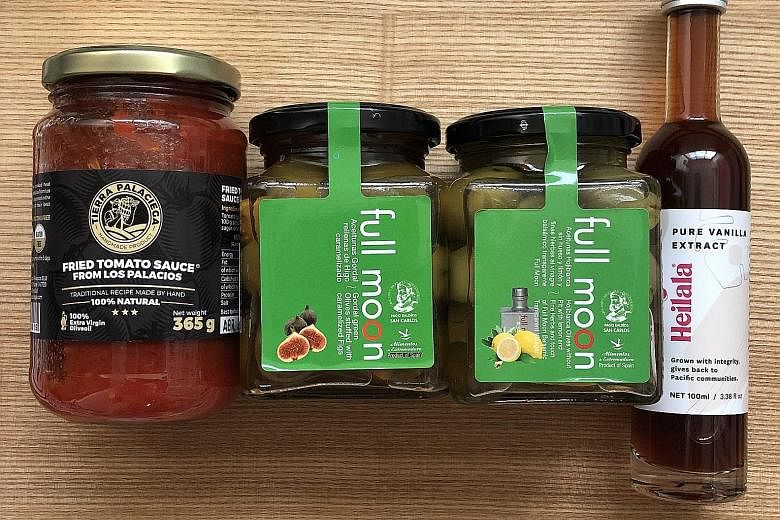 From far left: Fried tomato sauce, olives and vanilla extract from Foster Foods.