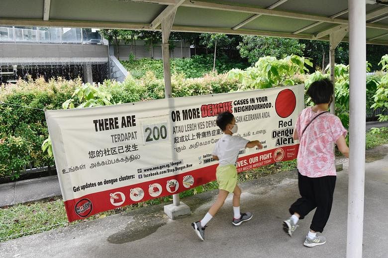 A dengue alert banner in the Woodleigh area. The National Environment Agency said there were 334 active dengue clusters islandwide as at Wednesday, well up on the 205 clusters three weeks ago.