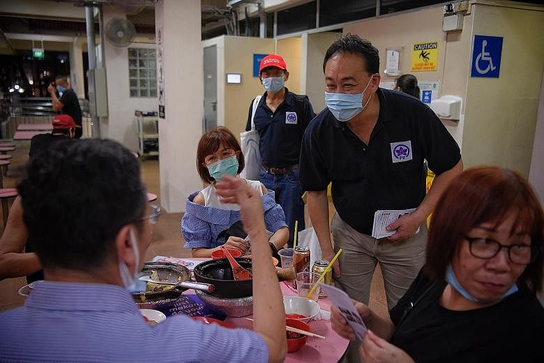 Peoples Voice party chief Lim Tean speaking to patrons at Golden Mile Food Centre yesterday. Mr Lim, who is contesting Jalan Besar GRC, called on voters there to treat the election as a referendum on Manpower Minister Josephine Teo, whom he said was 