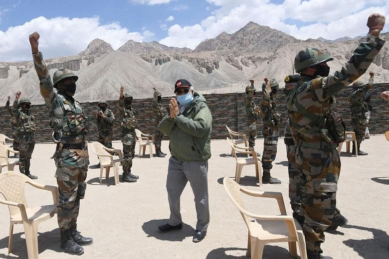Prime Minister Narendra Modi with Indian troops stationed in the Himalayan region of Ladakh yesterday. He met the top leadership of the Indian Army and interacted with soldiers in Nimu, which is about 250km from where the worst border clash in 45 yea