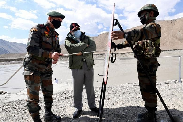 Mr Modi's visit with soldiers in Ladakh yesterday came amid a face-off between Indian and Chinese troops at multiple locations along the Line of Actual Control, the de facto border in the region.