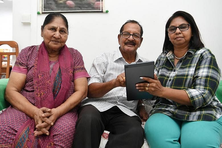 kMs Shanti Shanmugam, 54, recently subscribed to Tamil Murasu and The Straits Times. Her father, Mr Shanmugam Renganathan, 81, used to buy Tamil Murasu from news-stands, but found it inconvenient to do so during the Covid-19 pandemic. Pictured with t