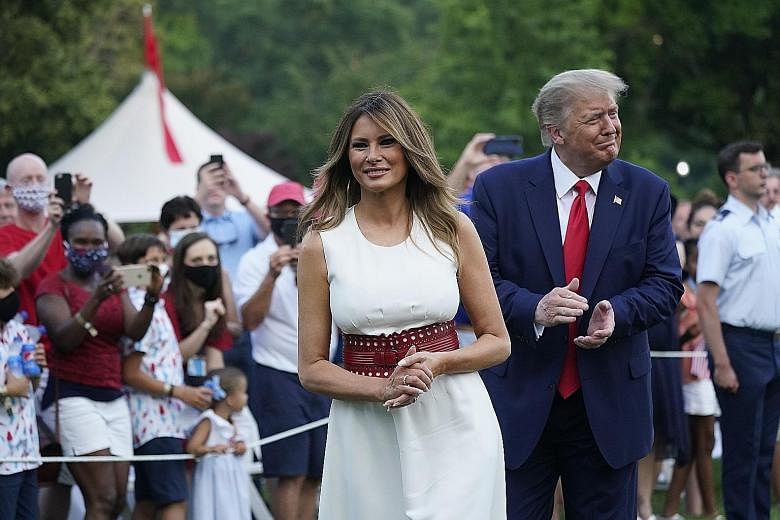 US President Donald Trump and First Lady Melania Trump at the Salute to America event on the South Lawn of the White House in Washington last Saturday. Mr Trump has cast himself as the heir to "American heroes" who defeated Nazis, fascists, communist