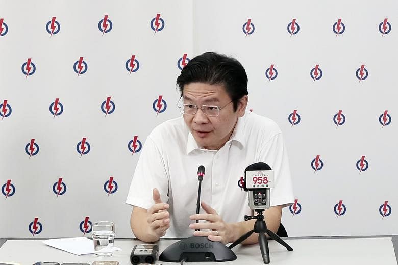 National Development Minister Lawrence Wong, speaking at the People's Action Party's Woodgrove branch yesterday, addressed SDP chairman Paul Tambyah's remarks on the Government's handling of the Covid-19 crisis.