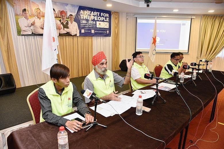 Singapore Democratic Alliance candidates for Pasir Ris-Punggol GRC (from left) Kelvin Ong, Harminder Pal Singh, Desmond Lim Bak Chuan, Abu Mohamed and Kuswadi Atnawi at a media conference in Changi yesterday.