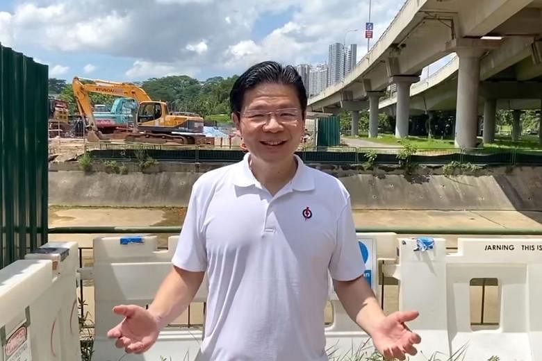 National Development Minister Lawrence Wong, who is leading the People's Action Party team in Marsiling-Yew Tee GRC, telling residents about a new bridge that will be built in Limbang in a video uploaded on Facebook yesterday.