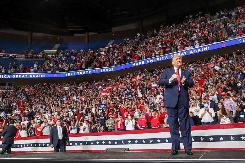 President Donald Trump talking to supporters at his rally in Tulsa, Oklahoma, on June 20 - his first reelection campaign event in several months in the midst of the coronavirus outbreak in the US.