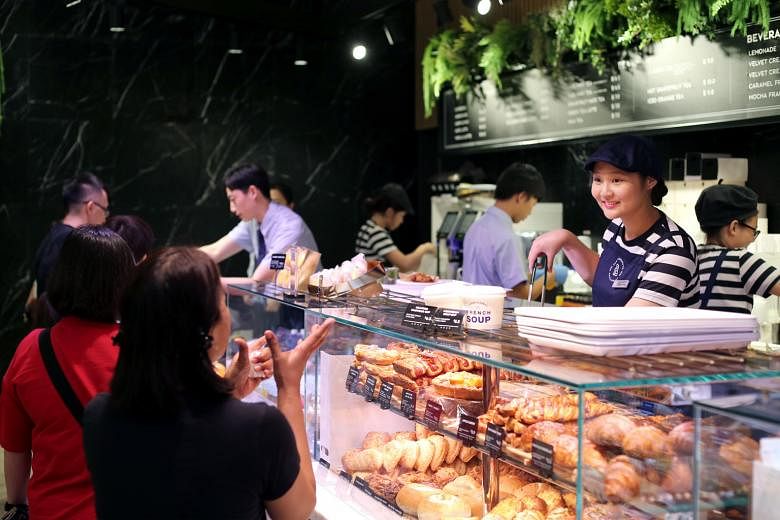 A Paris Baguette outlet at Jewel Changi Airport. The family behind the bakery chain are South Korean and were worth about US$3.6 billion (S$5 billion) five years ago. They are left with some US$770 million, according to the Bloomberg Billionaires Ind