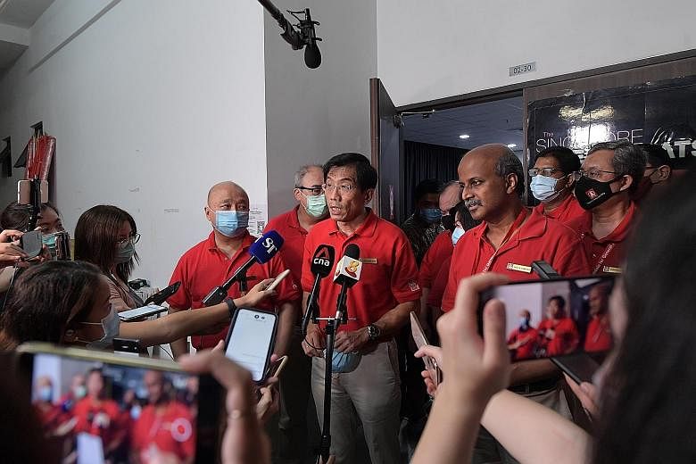 Singapore Democratic Party chief Chee Soon Juan and chairman Paul Tambyah making a statement to the media at the party headquarters in Ang Mo Kio at about 1.40am, even before the results were confirmed, conceding defeat after the sample counts indica