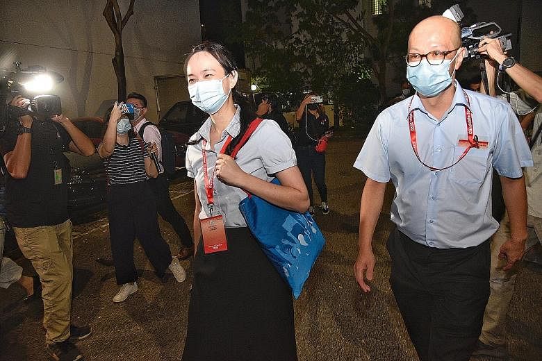 Candidates from the Workers' Party's East Coast team, Ms Nicole Seah and Mr Terence Tan, arriving at the party's headquarters last night. After the results were announced, Ms Seah thanked voters for their support, saying the team knew it would be a t
