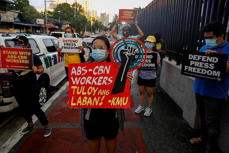 ABS-CBN supporters outside the broadcaster's headquarters in Quezon City, Metro Manila, on Thursday, as the Philippine Congress was deciding its fate.