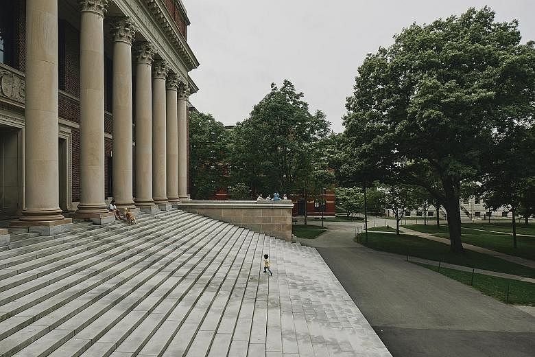 A nearly empty campus at Harvard University last week. Harvard said about 40 per cent of students would return to its campus in Cambridge, Massachusetts, while all courses will be taught remotely.