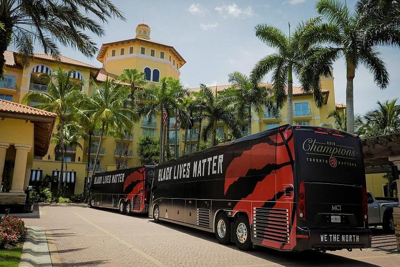 The team buses of NBA champions Toronto Raptors arriving at the ESPN Wide World of Sports Complex in Orlando, Florida, for the training camp before the season restart.