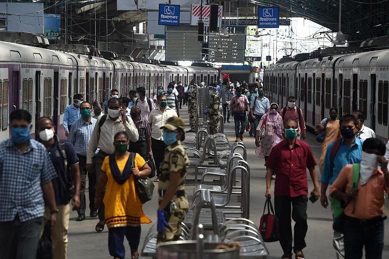 Travellers at the Churchgate station in Mumbai last month. India's plan to allow private players on the rail network will see them operate 151 trains on 109 routes around some key cities by April 2023. PHOTO: AGENCE FRANCE-PRESSE