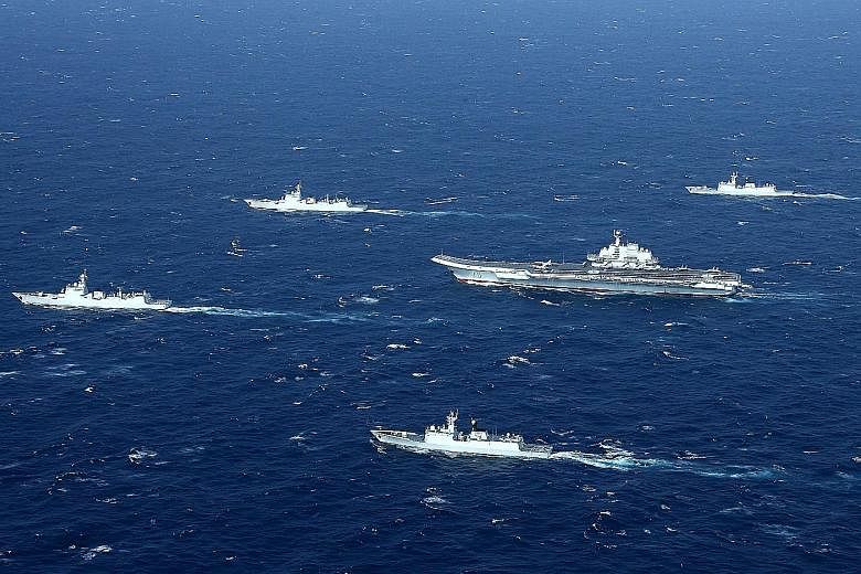 A January 2017 photo showing Chinese military drills in the South China Sea. China claims a large swathe of the South China Sea within its "nine-dash line", including waters and maritime entitlements within the exclusive economic zones of other coast