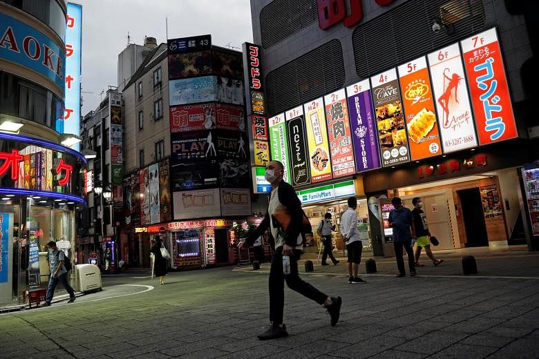 The famous entertainment district of Kabukicho in Shinjuku, Tokyo, this week. Citing analysis by experts, Tokyo Governor Yuriko Koike said yesterday that infections were clearly spreading in the capital. She stressed utmost vigilance, although she de