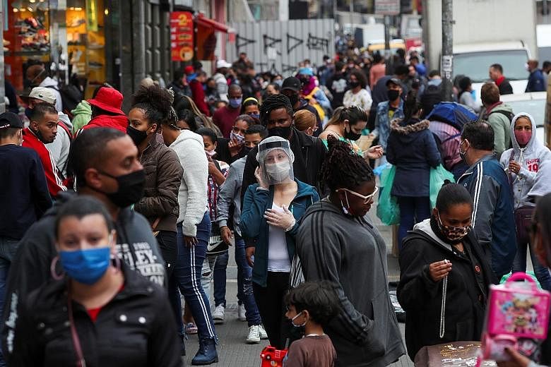 A popular shopping street filled with pedestrians on Wednesday in Sao Paulo, where the coronavirus outbreak first emerged in Brazil. Despite the rapid spread of the virus, President Jair Bolsonaro has pressured local governments to lift lockdown rest