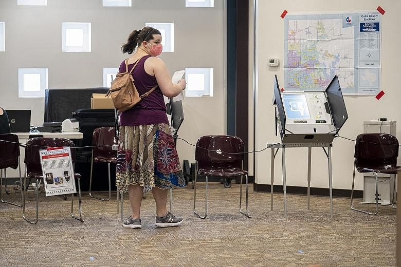 A woman casting a ballot during the primary run-off election in Dallas, Texas, on Tuesday. With the presidential election approaching, the influence that social media platforms have on politics has become a hotly debated issue.