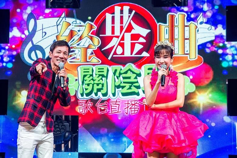 Getai performers Wang Lei (left) and Lee Pei Fen in an online getai show by Lex(S) Entertainment Productions last month. 