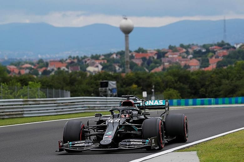 Mercedes' Lewis Hamilton is also aiming to win today's Hungarian Grand Prix for the eighth occasion to equal Michael Schumacher's record for victories at the same grand prix. The Ferrari great won eight times at the French Grand Prix. PHOTO: REUTERS