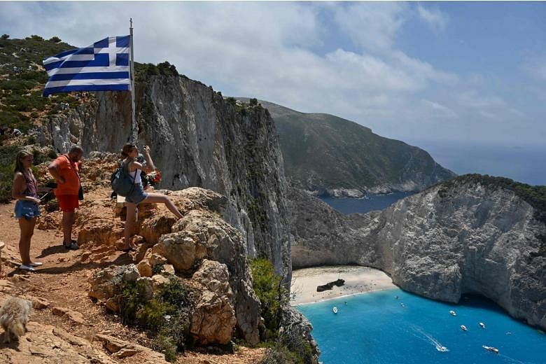 Amid the Covid-19 pandemic, tourism is slowly picking up again. There are now four boat departures daily to the famous Navagio (Shipwreck) beach on the Ionian island of Zakynthos, Greece, compared with the usual 20 for the season. 