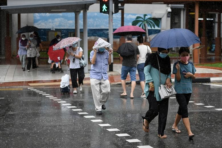 The wet weather in North Bridge Road last Monday. Looking at rainfall and mean temperature data for June and July over the past 20 years, there is a clear oscillating rhythm where temperature and rainfall peak in some years and fall in other years, s