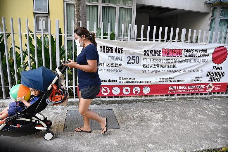 A dengue alert banner in Geylang. One of the two biggest clusters, each with 260 cases, is in the Aljunied-Geylang-Guillemard area.