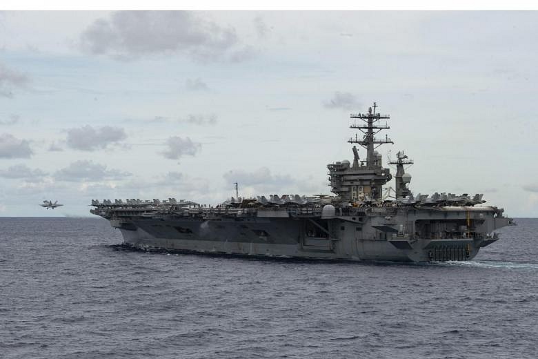 Indian navy holds exercises with US carrier Nimitz in tightening ...