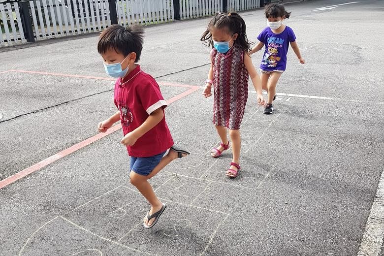 Children at Pat's Schoolhouse in Aroozoo Avenue played traditional games such as hopscotch and marbles to mark Racial Harmony Day. Yesterday, President Halimah Yacob said on Facebook that Racial Harmony Day is a timely occasion for Singapore to reaff