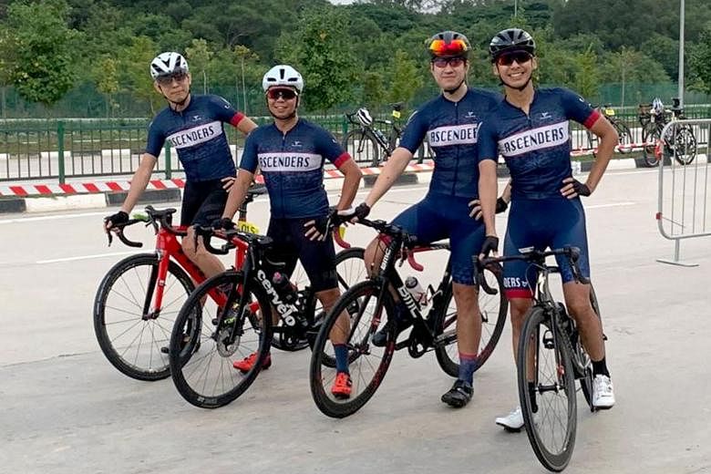 Left: Cyclists participating in The Straits Times Ride last year. The annual OCBC Cycle typically attracts about 7,000 participants. ST FILE PHOTO Below: Ric Sim (second from right) with his Ascenders team. The business analyst will take part in this