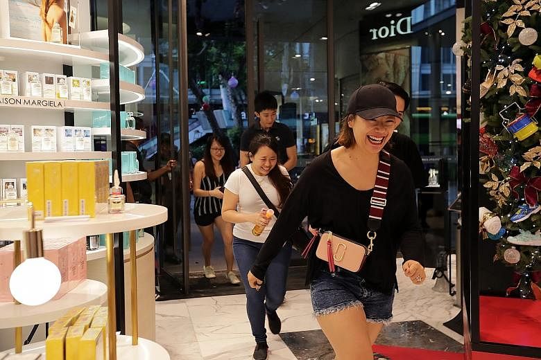 People rushing in to be among the first shoppers at Robinsons at The Heeren on Black Friday last year. This year's Great Singapore Sale will be a largely virtual event and will feature some 800 brands in its digital debut. Shoppers can go to GoSpree.