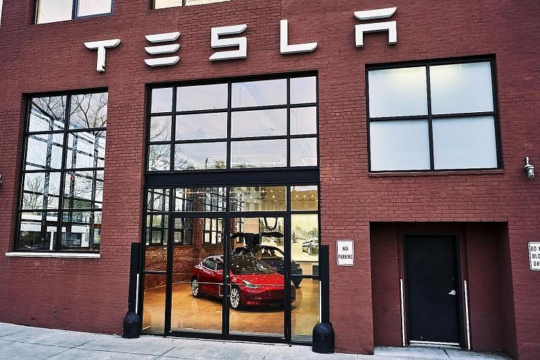 A Tesla showroom in the Red Hook section of Brooklyn in February. While several carmakers have added new models intended to cut into Tesla's electric dominance, they have barely made a dent, at least in the United States.