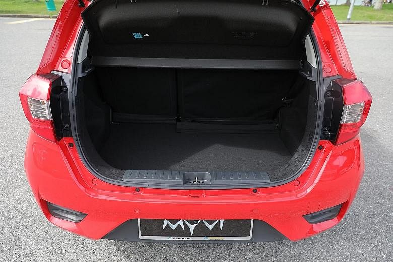 The Perodua Myvi has an anti-snatch handbag hook at the side of the front passenger's seat near the driver and ample boot space for a car of its size.