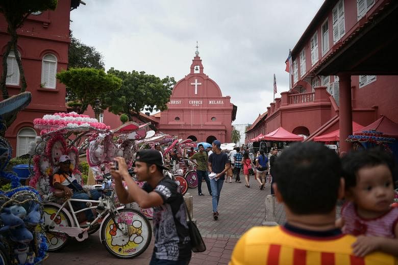 Travel requirements between Singapore and Malaysia will stay stringent, so short trips to popular Malaysian destinations like Melaka (above) are unlikely in the near future. ST FILE PHOTO