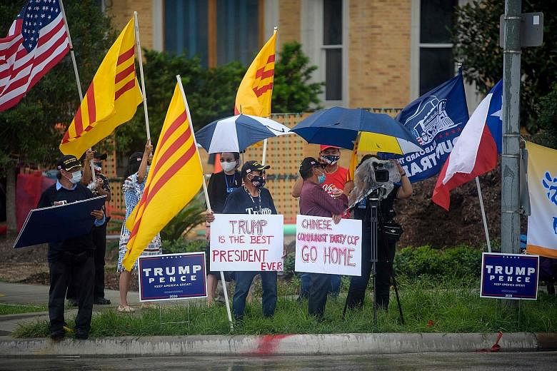 Protesters outside the Chinese consulate in Houston on Friday. US officials said Chinese consulates in the United States promoted international talent recruitment programmes, which can create incentives to steal intellectual property and create confl