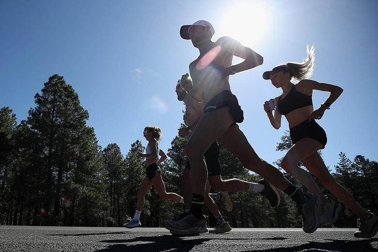 The Hoka Northern Arizona Elite professional distance running team during a training session last month in Flagstaff, Arizona. They later partnered another pro team in Boulder, Colorado, to host a 3.2km time trial. They livestreamed the race on Insta