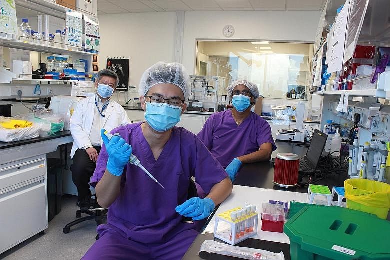 (From left) Associate Professor Eric Yap, PhD candidate Wee Soon Keong and Dr Sivalingam Paramalingam Suppiah, who are part of the team from Nanyang Technological University's Lee Kong Chian School of Medicine that developed the new testing method. I