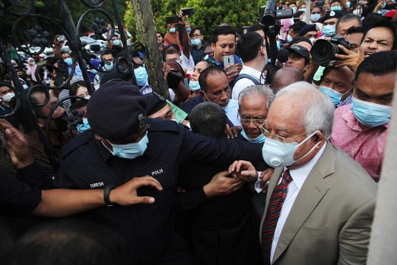 Ex-Malaysian PM Najib Gets 12 Years' Jail In 1MDB-linked Graft Trial ...