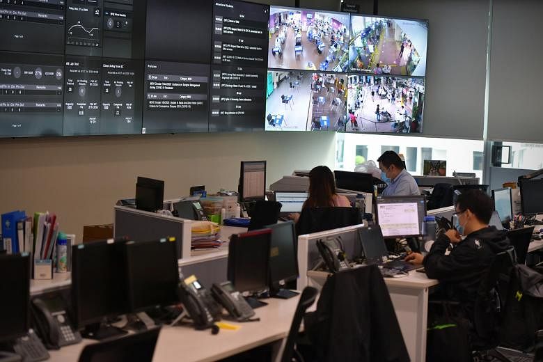 Tan Tock Seng Hospital's command, control and communications system at its operations command centre helps control the flow of resources across the hospital and the National Centre for Infectious Diseases. ST PHOTO: NG SOR LUAN