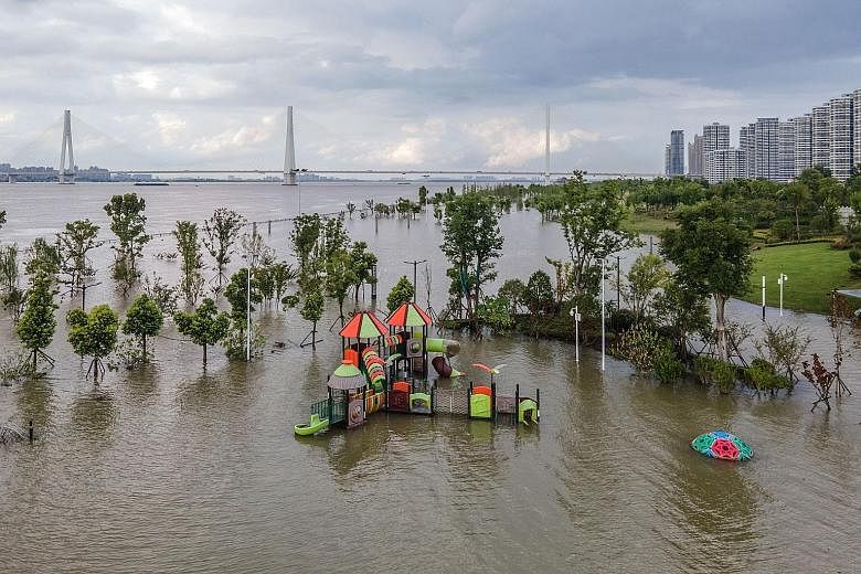 A flooded sports ground along the Yangtze River in Wuhan in China's central Hubei province. Floods in the country caused by continuous heavy rain since last month have affected some 54.8 million people in 27 provincial regions as of Tuesday, said the