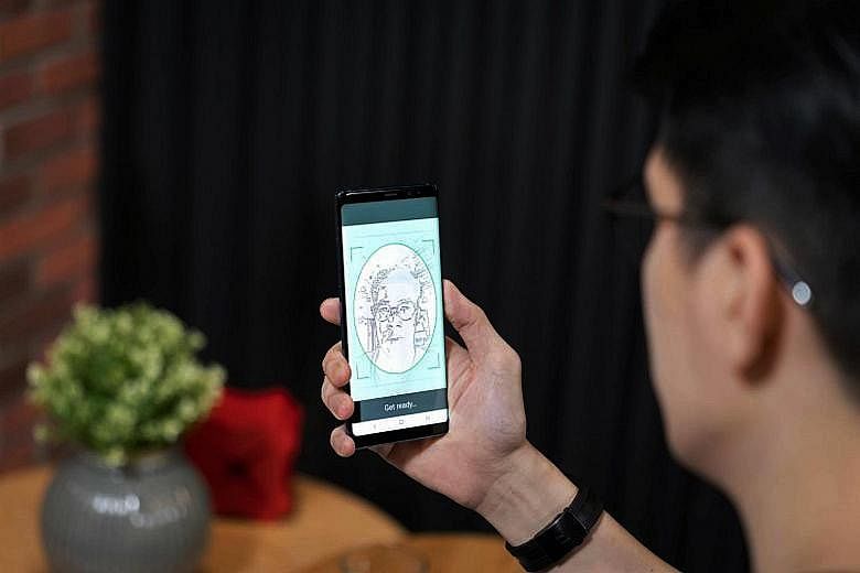 Private-sector organisations, such as DBS Bank, can now tap the nation's digital identity infrastructure to securely verify online transactions. PHOTO: DBS