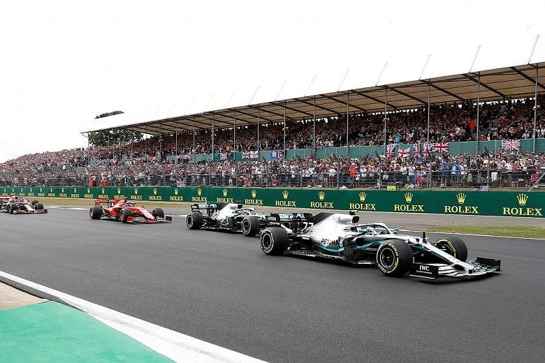 Fans cheering on Lewis Hamilton as the Briton chased Mercedes teammate Valtteri Bottas before claiming a sixth British Grand Prix win last year. He is seeking a record extending seventh victory on Sunday.