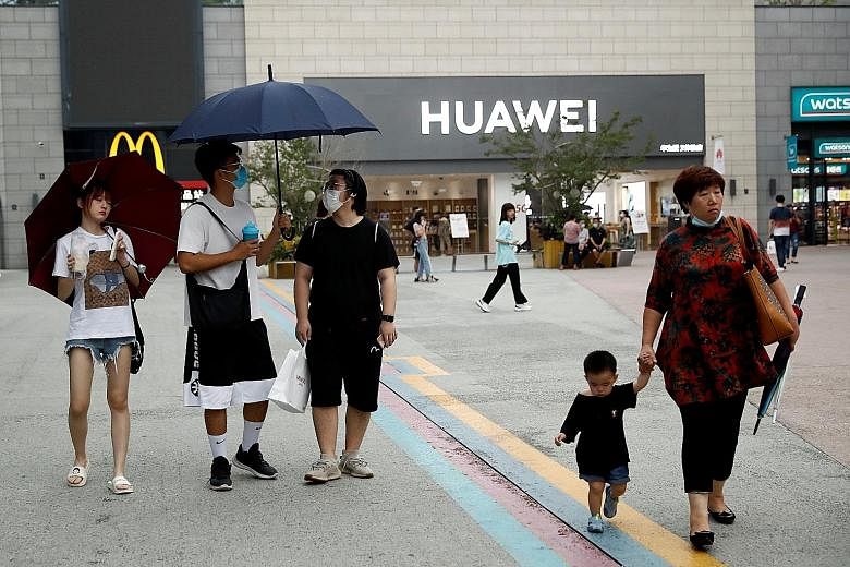 China's Huawei has felt the heat of US sanctions that have disrupted its business overseas, but the latest numbers show its rising dominance in its home market. It now sells nearly two-thirds of its handsets in China. PHOTO: REUTERS