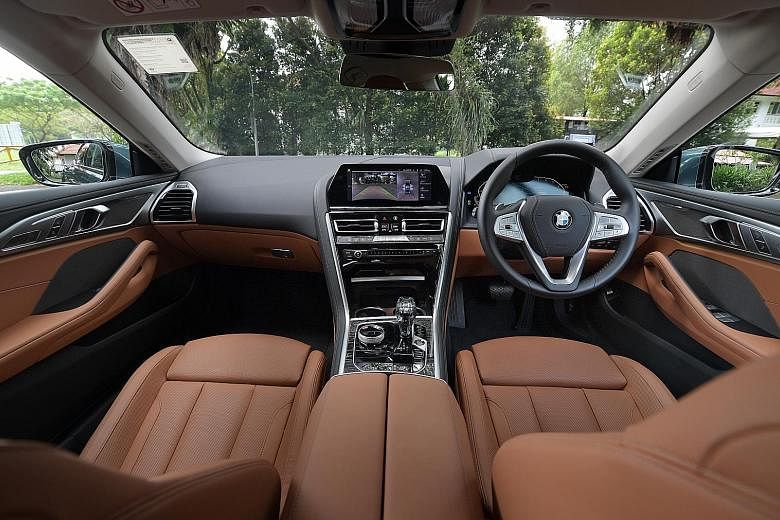 The cabin of the BMW 840i Gran Coupe is immaculately finished with glass, veneer and leather. The BMW 840i Gran Coupe, measuring 5,082mm by 1,932mm by 1,407mm tall, exudes a commanding presence.