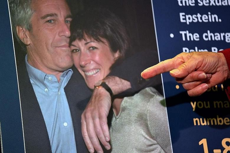 A file photo of socialite Ghislaine Maxwell with financier Jeffrey Epstein. There were e-mails between them as late as 2015 despite her lawyer's statement that she had "no contact" with him in a decade.