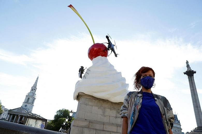 British artist Heather Phillipson's The End, installed on a plinth in Trafalgar Square, was conceived in 2016, not long after Britain voted to leave the European Union, and she had wanted the sculpture to look precarious because that was how the worl
