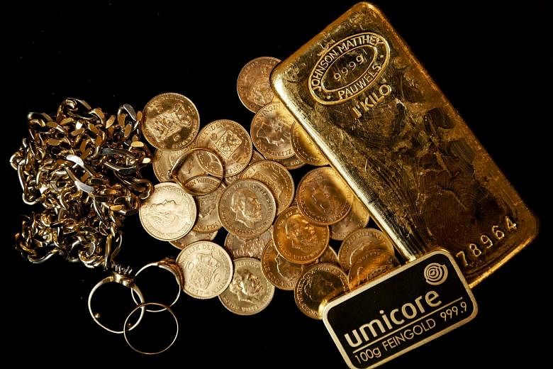 Gold for immediate delivery is closing in on US$2,000 an ounce as the search for safe-haven assets continued amid Covid-19. More gains are seen for the metal as the path to economic recovery remains uncertain. PHOTO: EPA-EFE